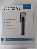 Front view of Woner cordless rechargeable hair clippers box highlighting key features such as titanium and ceramic blade, 5 length control, and 2000mAh lithium battery.