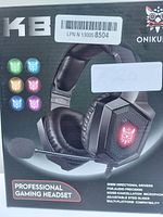 Front view of boxed K8 professional gaming headset featuring Onikuma branding and color lighting samples on box.