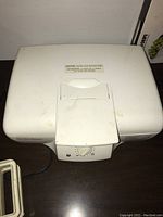 Photo of Toastmaster ST-14 toaster showing top view with dial and white surface with minor spots and scratches.