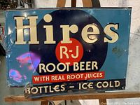 Front of sign showing embossed Hires logo, R-J circle, text and overall color
