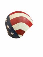 Left side view showing red and white stripes transitioning into blue field with stars.