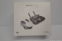 Retail packaging box showing Mavic Mini drone and controller