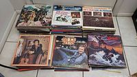 Stacks of vinyl LPs showing Black Oak Arkansas Street Party, The Everly Brothers Greatest Hits, Jan & Dean Live In Person, Charley Pride Greatest Hits and Mel Tillis Are You Sincere