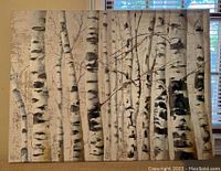 Front view of large painting of birch trees, showing white, gray, black, gold and brown colors.