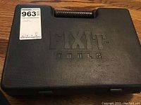 Closed case front with FIXIT TOOLS embossing and MaxSold label