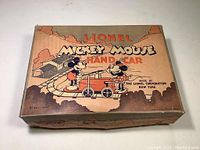 Original cardboard box lid with 'Lionel Mickey Mouse Hand Car' graphics