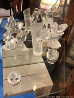 Overview of all five crystal figurines displayed