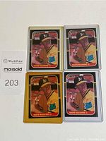 Four 1987 Donruss Mark McGwire rookie baseball cards arranged in two rows, each card showing the front image of McGwire in Oakland Athletics uniform.