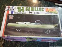 Top view of the model kit box showing the car image and branding