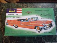 Full top view of the box showcasing box art and details of the model kit including Revell branding and Cadillac Eldorado illustration.