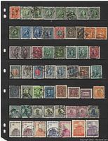 Full view of stamps on black card stock showing several rows of used Chinese stamps with portraits and various colors.