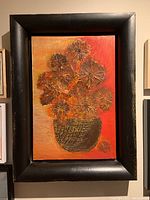 Framed original floral painting showing full view with dark distressed wood frame