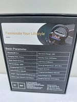 Photo of the back of the earbud box showing technical specifications like Bluetooth 5.1, 10m operation range, charging time, battery capacity, and physical weight.