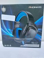 Photo of the PHOINIKAS H-6 headset box showing headset image and features.