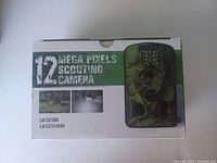 Box front showing camera image and 12 mega pixels scouting camera text, model Ltl-5210A / Ltl-5210MM