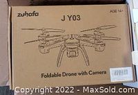 Box of Zuhafa JY03 Foldable Drone With Camera showing brand name and model number on packaging.