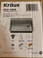 Front label of Kraus KCC-1400 packaging showing model, materials, dimensions and list of included accessories