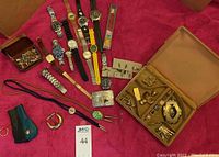 Overall view of all items laid out on pink background