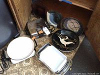 Photo showing Manning Bowman waffle iron, Pyrex dishes, nonstick pan, Fire King pan, and Corning Ware skillet base.