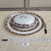 Set of three antique semi porcelain serving dishes by Myott, Son & Co including one covered dish and two open platters with hand painted floral border