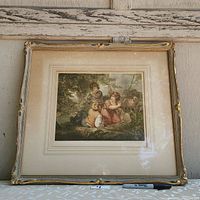 Front view of framed artwork showing detailed pastoral scene with children and sheep.