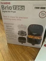 Front of the Nuwave Brio 7.25Q Digital Air Fryer box highlighting features and cooking basket with fries image.