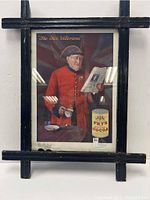 Full view of antique framed poster showing war veteran in red coat holding a newspaper, background with Union Jack flag, and Fry's Pure Breakfast Cocoa tin illustration.