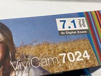 Box front showing Vivitar ViviCam 7024 camera image and 7.1 MP with 4x digital zoom features