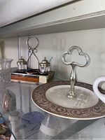 Salt and pepper shakers, condiment holders, decorative plate with holder