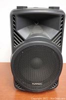 Front view of Furrion PA speaker showing woofer grille and horn tweeter section.