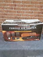 Box of Heat Stream Portable Kerosene Forced Air Heater with front view and details showing the model and heating capacity of 70,000 BTU.