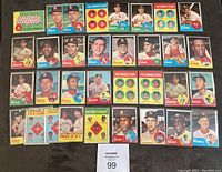 Thirty-four cards laid out on black background