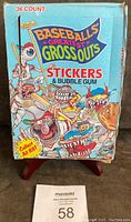 Front view of the original 1988 Leaf Baseball's Greatest Grossouts box showing colorful cartoon artwork and '36 count' label.