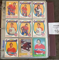 Binder page showing Montreal Canadiens player cards from late 1970s O-Pee-Chee set: Jean-Claude Tremblay, J.C. Tremblay, Serge Savard, Jacques Laperriere, Guy Lapointe, Rejean Houle, Dale Hoganson, NHL Action Montreal vs. Toronto sticker, Pierre Bouchard.