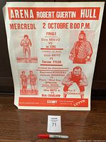 Full front view of the 1980s wrestling poster with details of the event in Hull at Robert Guertin Arena, printed in red with images of wrestlers.