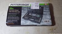 Photo of the front of the product box displaying 'Pittsburgh SAE 40 Pc Carbon Steel Tap and Die Set' with image of the set inside the case.