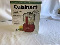 Front view of the Cuisinart Mini-Prep Plus food processor box showing the product image and features.