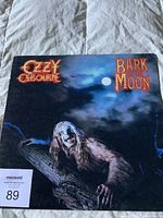 Front cover of Ozzy Osbourne Bark at the Moon vinyl LP showing album art of Ozzy as a werewolf under a full moon.
