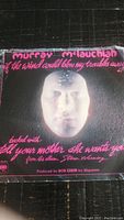 Photo of the vinyl record sleeve showing the front cover with title and artist name.