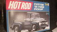 Boxed Revell plastic model kit of Custom 56 Ford Pickup truck showing front and side view of kit box with truck image and branding.