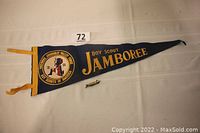 Full view of the 1964 Boy Scouts National Jamboree felt pennant and the 1957 Boy Scouts pocketknife