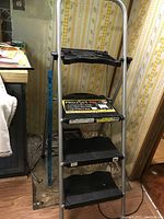 Full view of the Project Pro heavy duty utility stool showing full frame and steps.