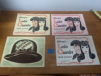 Four vintage paper items including three Chicago Latin Quarter Theatre Restaurant menus or photographs and one Brown Derby Menus or photograph from the 1940s era, showing artwork of man with beret and woman with floral headband, plus Brown Derby circular logo and location details.