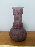 Full view of the bulbous shaped glass vase with hand painted watercolour style design and matte finish.