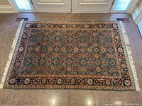 Full overhead view of entire rug showing overall pattern and condition