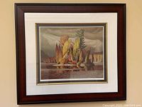 Full view of framed print against wall