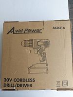 Box front showing Avid Power branding, product line ACD316, 20V cordless drill/driver illustration.