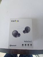 Box of EarFun Free 2 true wireless Bluetooth earbuds showing front with brand, model and key features.