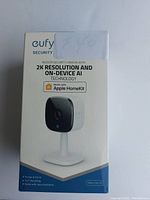 Front view of the Eufy Indoor Security Camera retail box showing product image and key features.