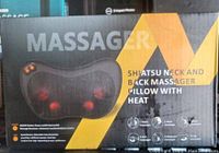 Box of Shiatsu neck and back massager pillow with heat showing product image and feature highlights.